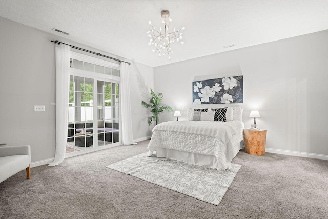 5165 Hamptonshire Dr, Dublin, OH 43016 - bedroom with carpet floors, access to outside, a chandelier, and baseboards