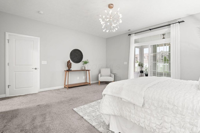 5165 Hamptonshire Dr, Dublin, OH 43016 - carpeted bedroom featuring a chandelier, baseboards, and access to exterior
