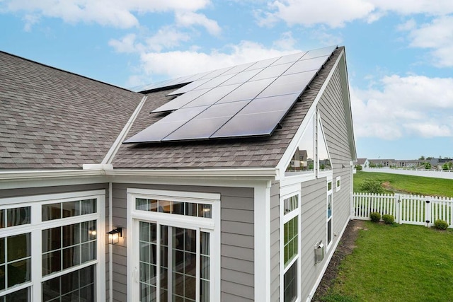 5165 Hamptonshire Dr, Dublin, OH 43016 - view of home's exterior featuring roof with shingles and solar panels