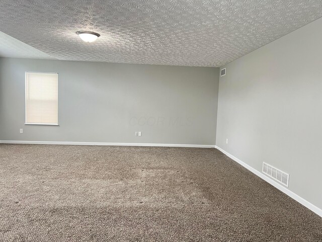 5966 Twin Pine Dr, New Albany, OH 43054 - carpeted empty room featuring a textured ceiling and baseboards