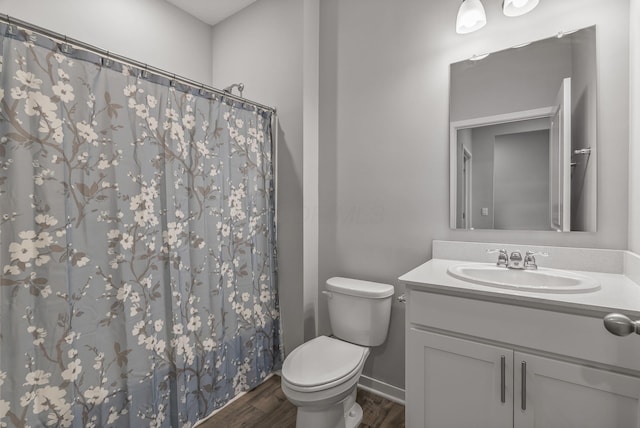 759 Abby Dr, Plain City, OH 43064 - full bathroom featuring vanity, wood finished floors, toilet, baseboards, and a shower with curtain