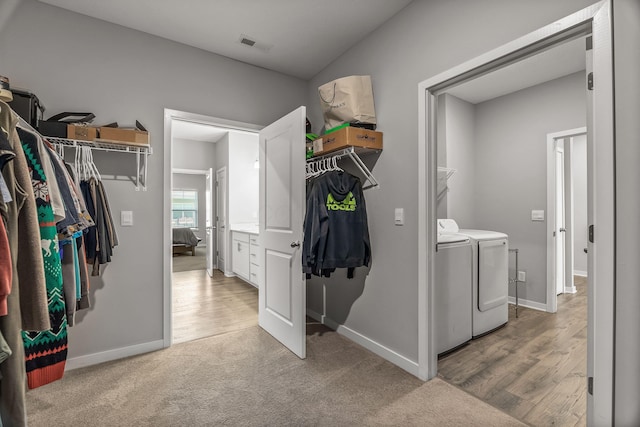 759 Abby Dr, Plain City, OH 43064 - washroom featuring washer and dryer, baseboards, and light colored carpet