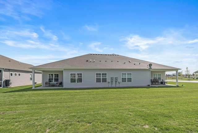 759 Abby Dr, Plain City, OH 43064 - rear view of house featuring a patio and a lawn