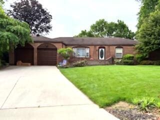 1155 Rockport Ct, Columbus, OH 43235 - ranch-style house with an attached garage, concrete driveway, and a front yard