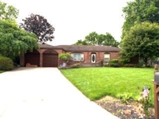 1155 Rockport Ct, Columbus, OH 43235 - ranch-style home featuring a garage, a front lawn, and driveway