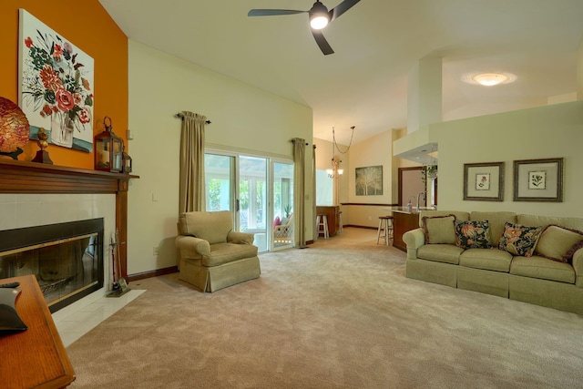 3695 Britton Ave, Columbus, OH 43204 - living area featuring high vaulted ceiling, carpet floors, ceiling fan, a fireplace, and a chandelier