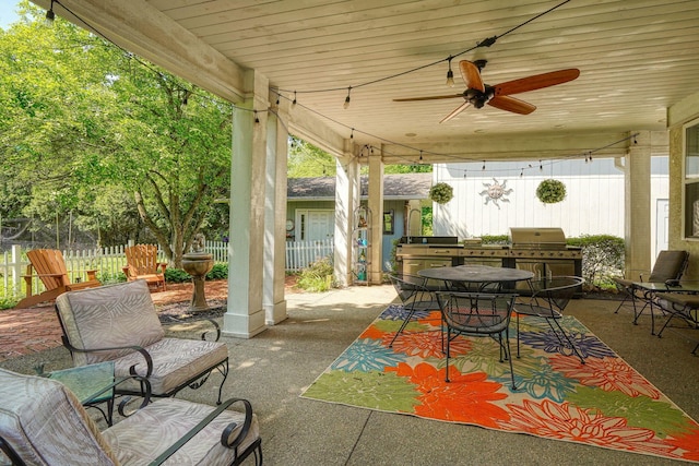 3695 Britton Ave, Columbus, OH 43204 - view of patio / terrace with outdoor dining space, fence, a ceiling fan, and grilling area