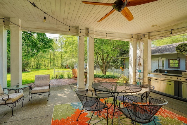 3695 Britton Ave, Columbus, OH 43204 - view of patio / terrace featuring fence, outdoor dining space, and a ceiling fan