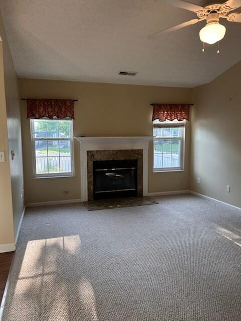6855 Falcon Ln Unit 4A, Canal Winchester, OH 43110 - unfurnished living room featuring healthy amount of natural light, a premium fireplace, and baseboards