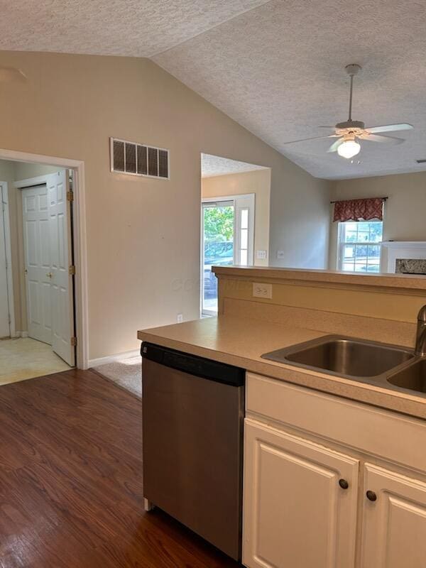6855 Falcon Ln Unit 4A, Canal Winchester, OH 43110 - kitchen with stainless steel dishwasher, dark wood-type flooring, ceiling fan, a textured ceiling, and plenty of natural light
