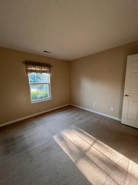 6855 Falcon Ln Unit 4A, Canal Winchester, OH 43110 - unfurnished room with dark carpet and baseboards