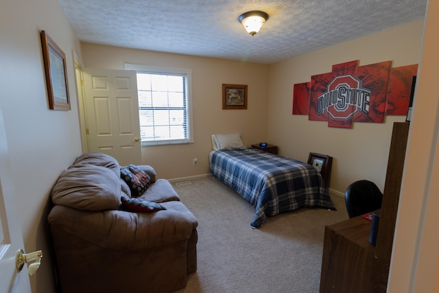 5392 Ponderosa Dr, Columbus, OH 43231 - carpeted bedroom featuring a textured ceiling and baseboards