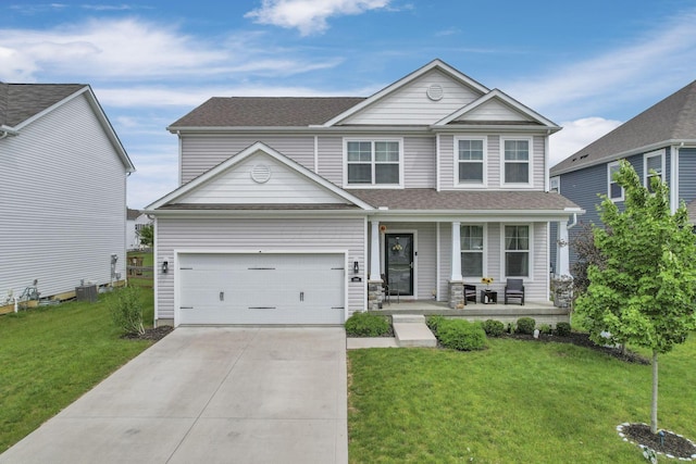 4196 Holstein Dr, Obetz, OH 43207 - craftsman house featuring a porch, driveway, a front yard, a garage, and roof with shingles