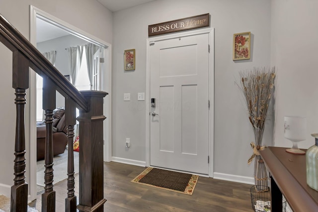 4196 Holstein Dr, Obetz, OH 43207 - foyer entrance featuring baseboards, wood finished floors, and stairway