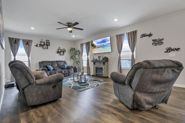 4196 Holstein Dr, Obetz, OH 43207 - living area featuring dark wood-style floors, plenty of natural light, a ceiling fan, and recessed lighting