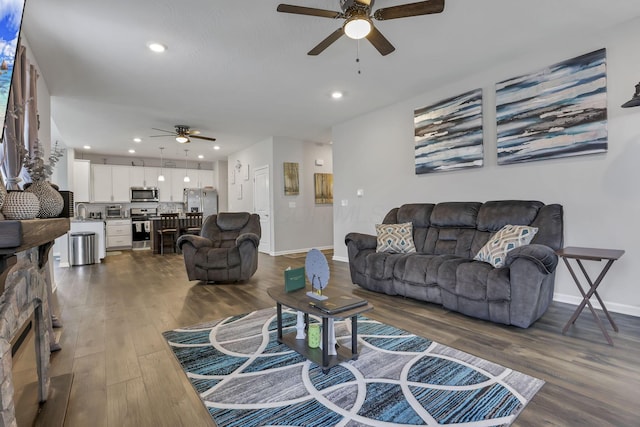 4196 Holstein Dr, Obetz, OH 43207 - living area featuring a ceiling fan, dark wood finished floors, baseboards, and recessed lighting