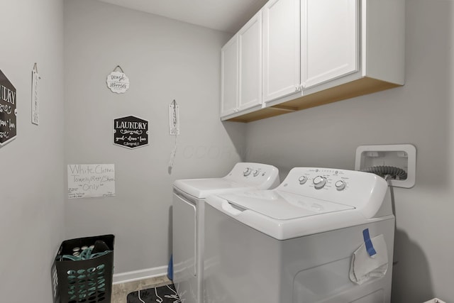 4196 Holstein Dr, Obetz, OH 43207 - laundry room with cabinet space, independent washer and dryer, and baseboards