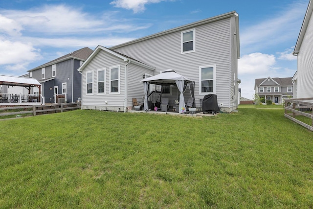 4196 Holstein Dr, Obetz, OH 43207 - rear view of property featuring a gazebo and a patio