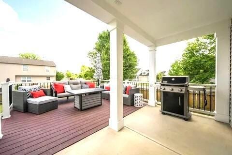 6004 Goldstone Dr, Grove City, OH 43123 - wooden deck with an outdoor living space and area for grilling