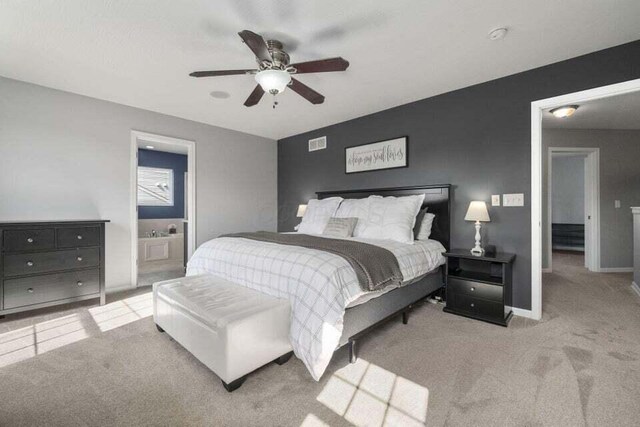 6004 Goldstone Dr, Grove City, OH 43123 - carpeted bedroom featuring baseboards, ceiling fan, and ensuite bathroom