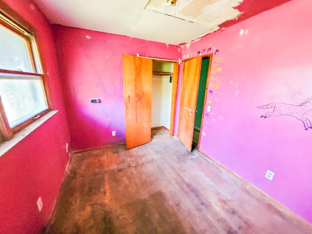 16251 State Route 678, Rockbridge, OH 43149 - unfurnished bedroom with a closet and wood finished floors