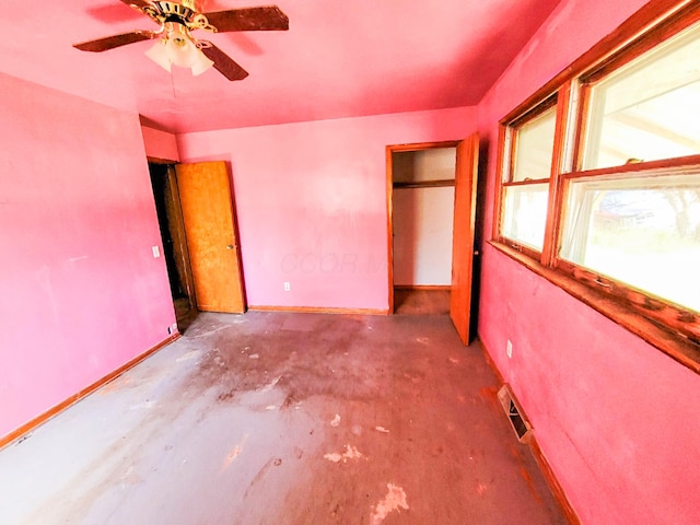 16251 State Route 678, Rockbridge, OH 43149 - unfurnished bedroom featuring unfinished concrete floors, baseboards, and ceiling fan