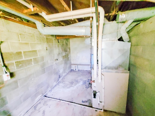 16251 State Route 678, Rockbridge, OH 43149 - unfinished basement with concrete block wall and heating unit