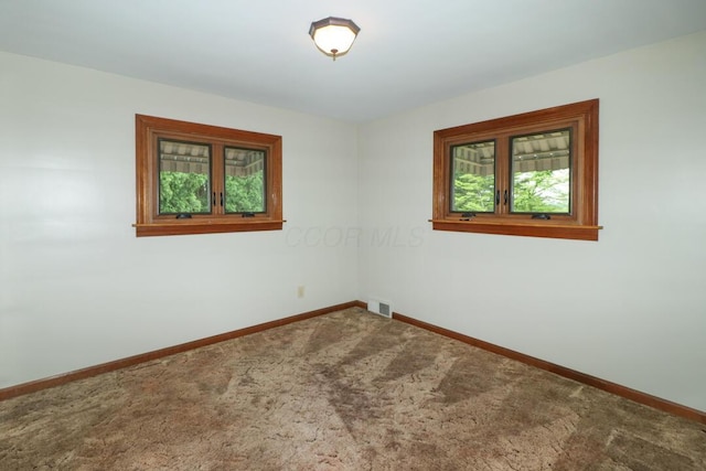 1266 Hanley Rd W, Mansfield, OH 44903 - spare room with carpet floors and baseboards
