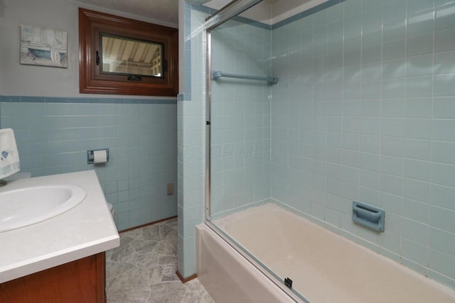 1266 Hanley Rd W, Mansfield, OH 44903 - full bathroom featuring tile walls, vanity, and enclosed tub / shower combo