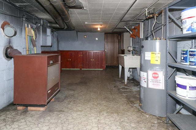 1266 Hanley Rd W, Mansfield, OH 44903 - basement with electric water heater and concrete block wall