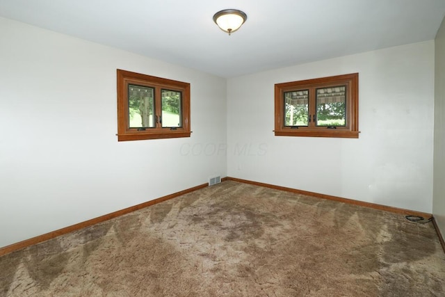 1266 Hanley Rd W, Mansfield, OH 44903 - spare room with carpet floors and baseboards