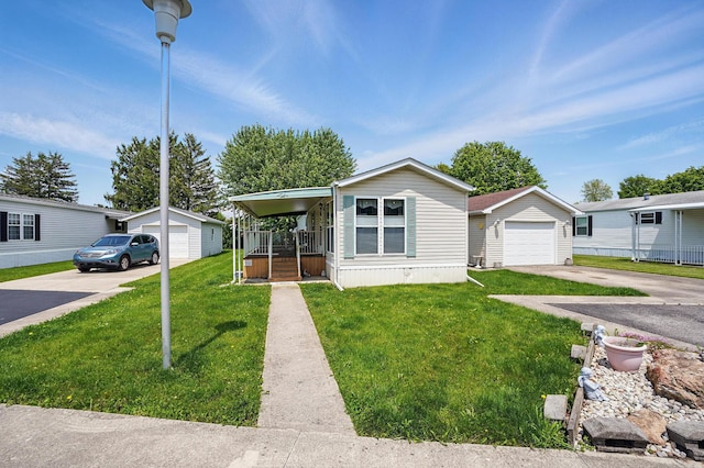 3200 Smeltzer Rd Unit 90, Marion, OH 43302 - manufactured / mobile home featuring an outbuilding, a garage, and a front lawn