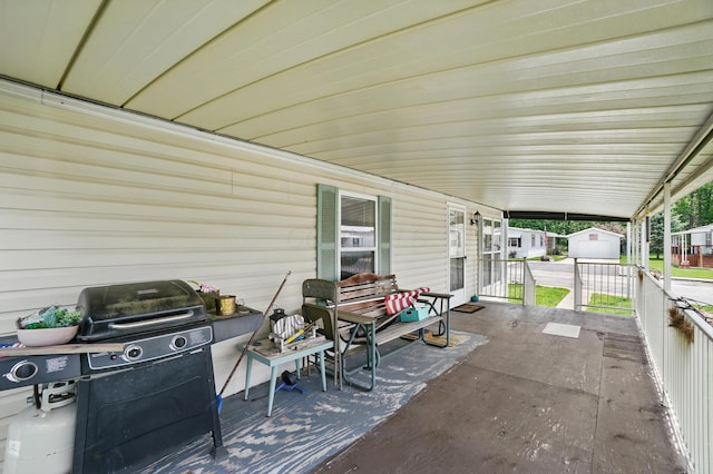 3200 Smeltzer Rd Unit 90, Marion, OH 43302 - view of patio with an outbuilding and a shed