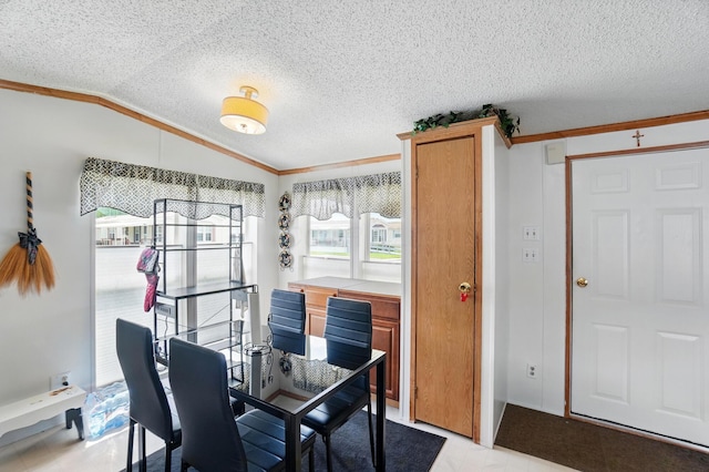 3200 Smeltzer Rd Unit 90, Marion, OH 43302 - dining room with lofted ceiling, ornamental molding, and a textured ceiling