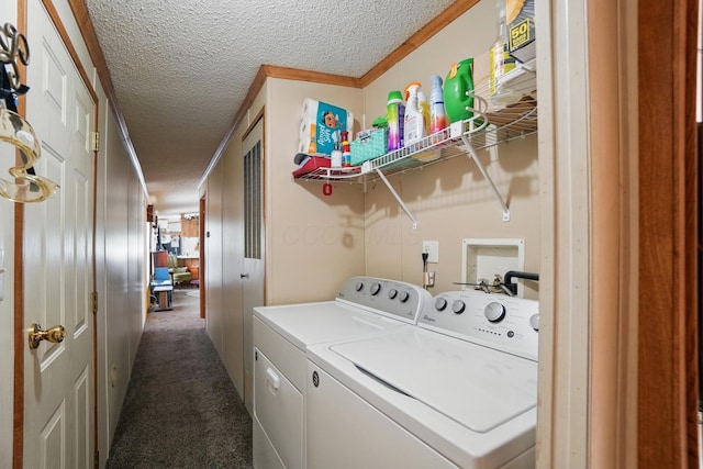 3200 Smeltzer Rd Unit 90, Marion, OH 43302 - laundry area with a textured ceiling, washing machine and dryer, and dark colored carpet