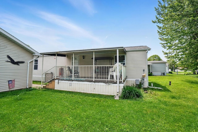 3200 Smeltzer Rd Unit 90, Marion, OH 43302 - rear view of house featuring a yard and covered porch