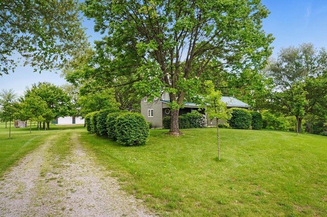 5870 Brook Rd NW, Baltimore, OH 43105 - view of grassy yard featuring driveway