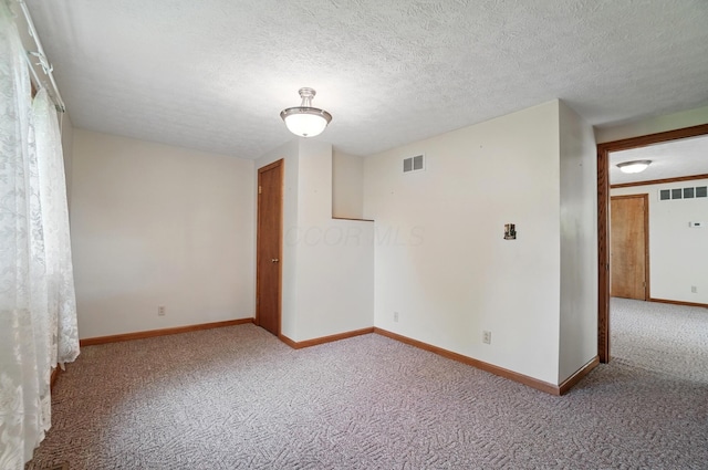 5870 Brook Rd NW, Baltimore, OH 43105 - carpeted spare room with baseboards and a textured ceiling