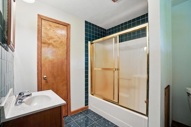 5870 Brook Rd NW, Baltimore, OH 43105 - full bathroom with combined bath / shower with glass door, toilet, tile patterned floors, and vanity