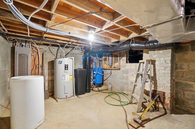 5870 Brook Rd NW, Baltimore, OH 43105 - unfinished below grade area with electric water heater, a water pressure tank, electric panel, and a water softener system