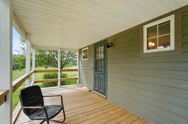 5870 Brook Rd NW, Baltimore, OH 43105 - deck featuring covered porch