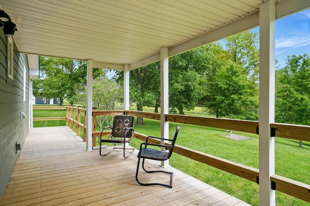 5870 Brook Rd NW, Baltimore, OH 43105 - wooden deck with a yard and view of scattered trees