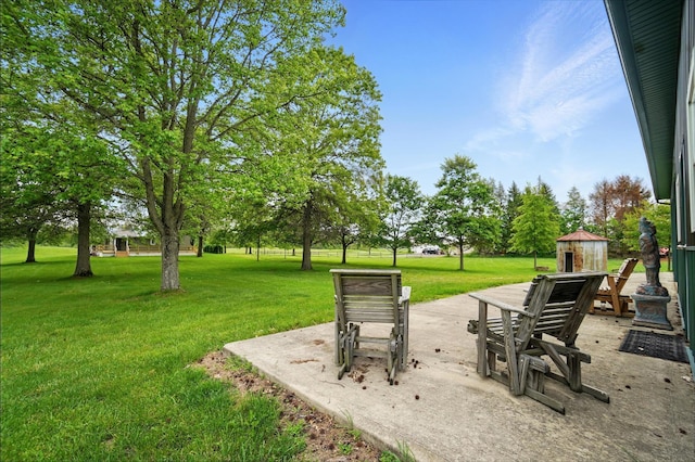 5870 Brook Rd NW, Baltimore, OH 43105 - view of grassy yard featuring a patio