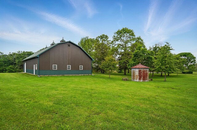 5870 Brook Rd NW, Baltimore, OH 43105 - view of property exterior with an outbuilding and a lawn