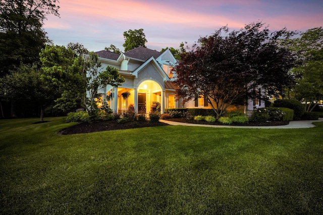 712 Riverbend Ave, Powell, OH 43065 - view of front of home featuring stucco siding and a yard