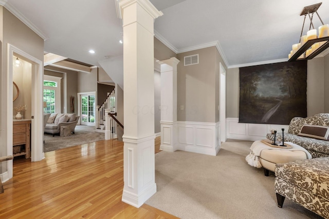 712 Riverbend Ave, Powell, OH 43065 - sitting room with decorative columns, ornamental molding, light wood-style floors, stairway, and recessed lighting