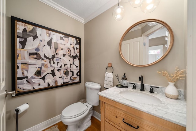 712 Riverbend Ave, Powell, OH 43065 - half bathroom with crown molding, baseboards, toilet, vanity, and wood finished floors