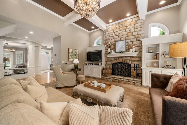 712 Riverbend Ave, Powell, OH 43065 - living room with a chandelier, ornamental molding, beamed ceiling, recessed lighting, and decorative columns