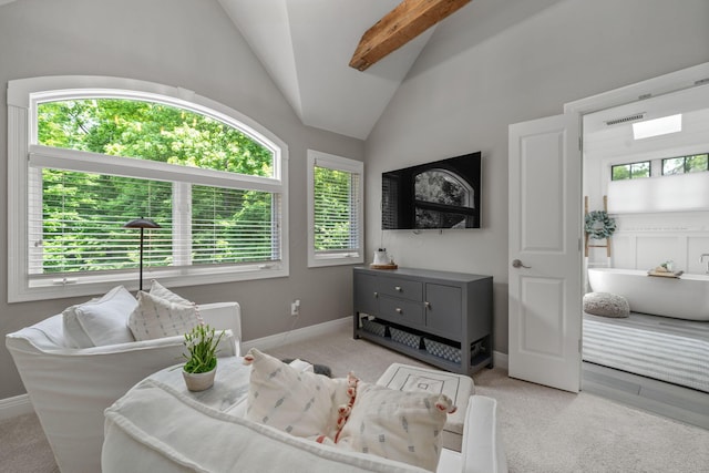 712 Riverbend Ave, Powell, OH 43065 - carpeted living room featuring plenty of natural light, vaulted ceiling, and baseboards