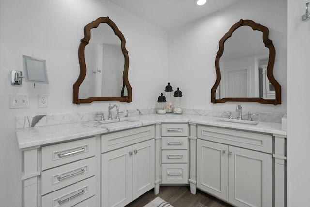 712 Riverbend Ave, Powell, OH 43065 - full bath featuring double vanity, recessed lighting, and wood finished floors